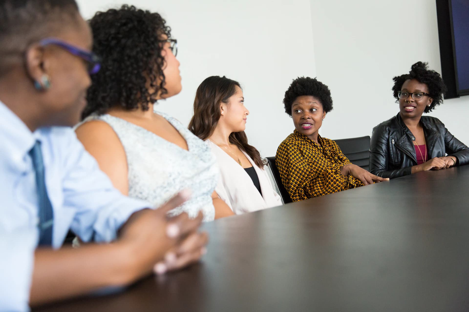 Diverse professionals collaborating across languages