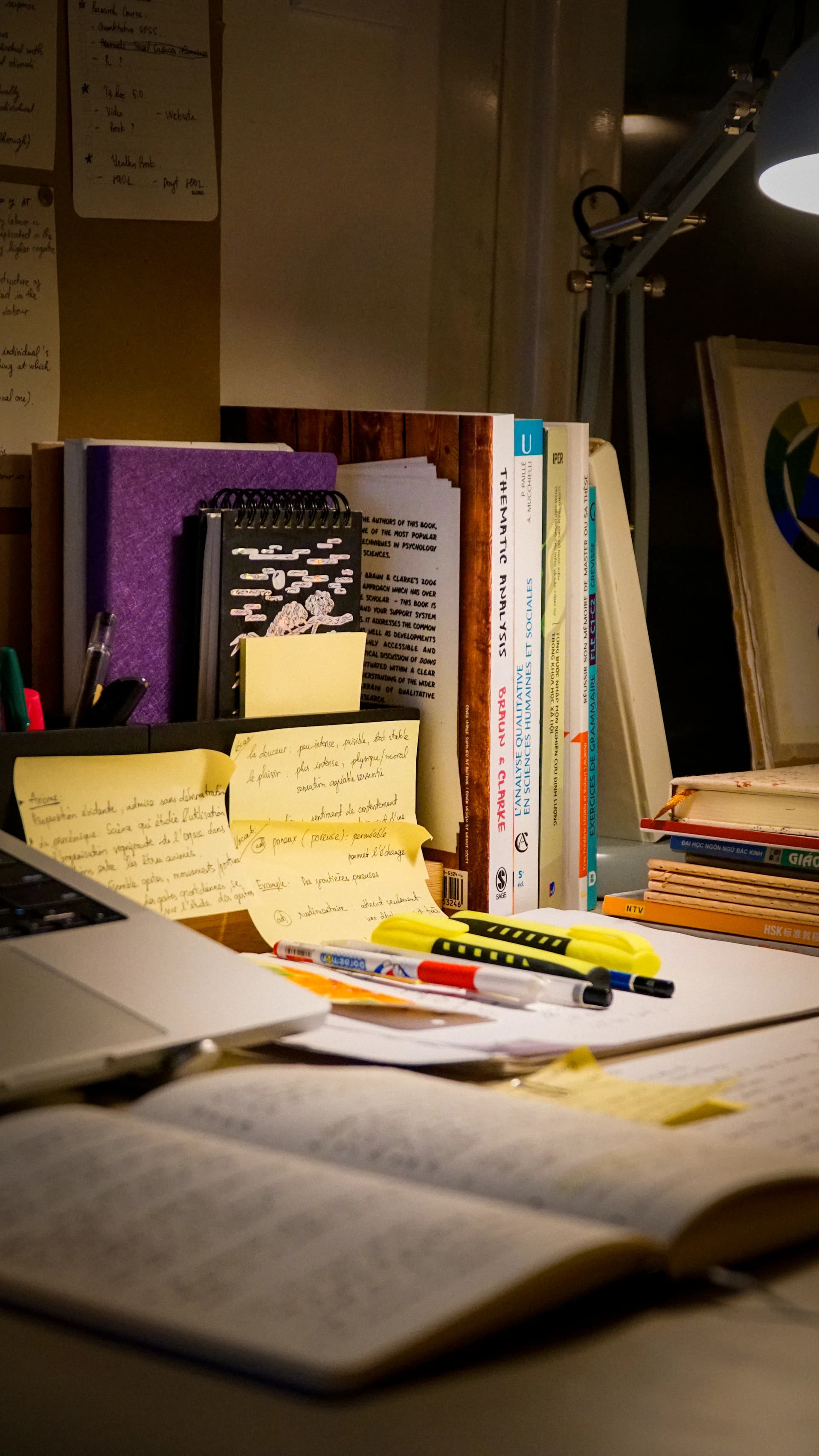 Self-paced study workspace with laptop and books