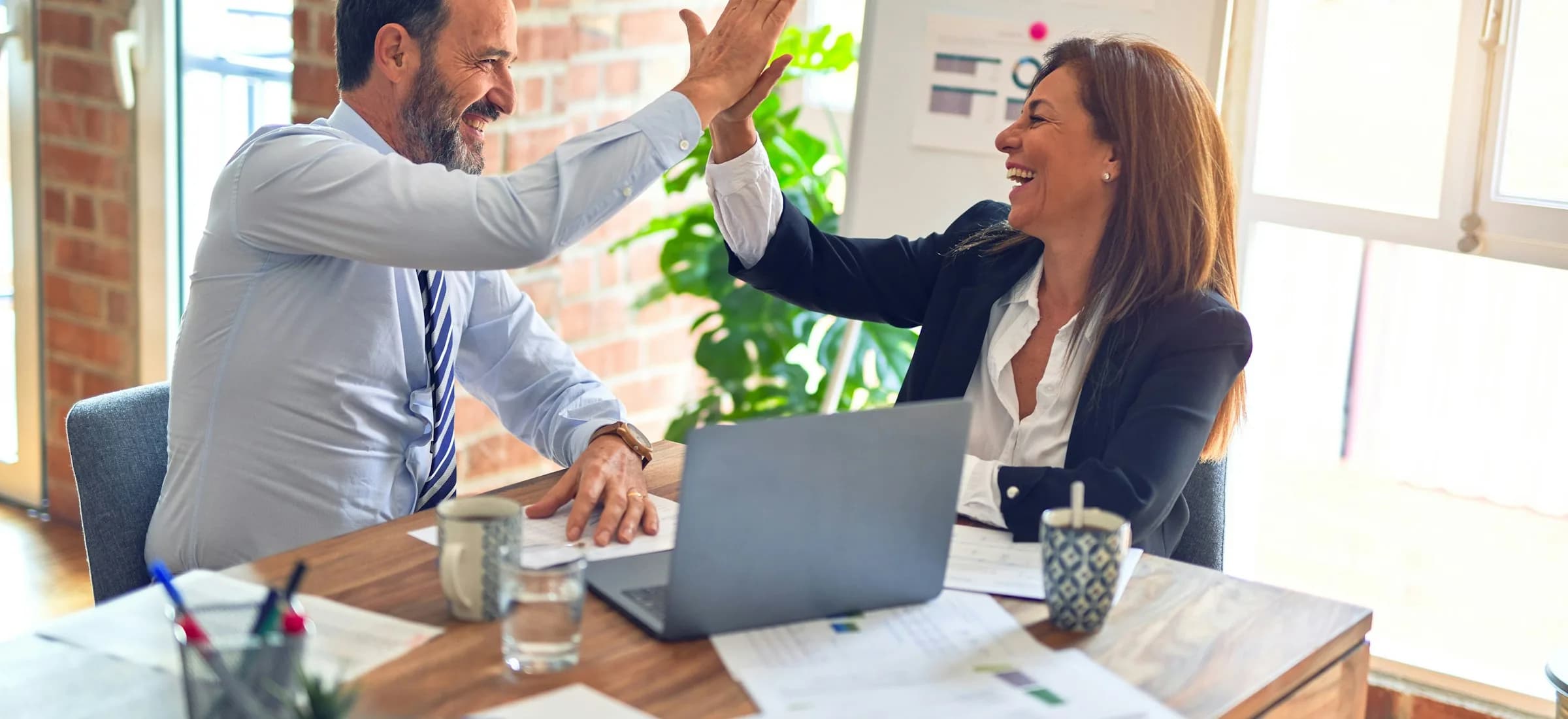Team collaborating in a bright, supportive workplace